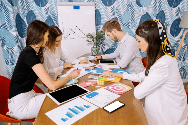 Marketers leveraging social media platforms to attract, engage, and convert audiences as part of an effective inbound marketing strategy.
